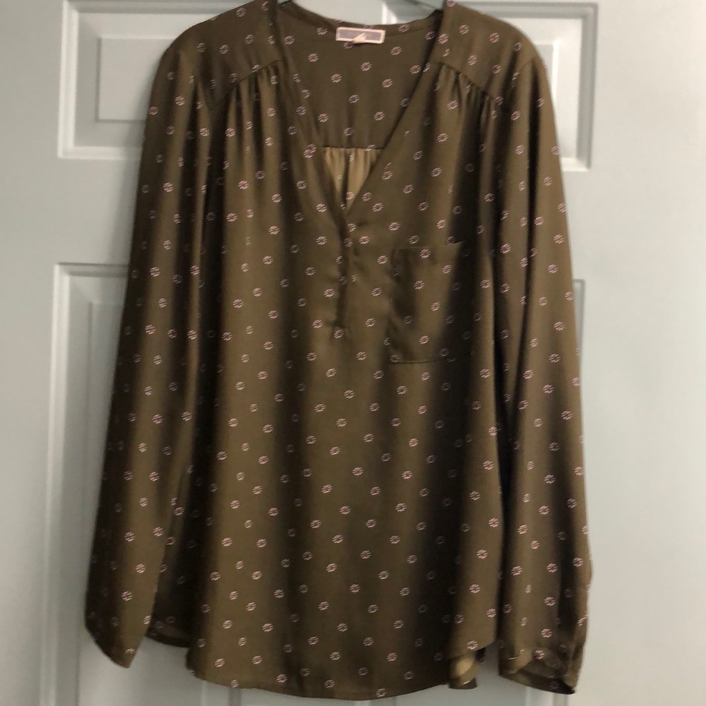 Pleione long sleeve v-neck with button bracelet cuff sleeve.  Patch front pocket